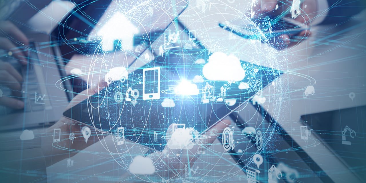 Abstract image of technology icons floating over hands holding tech items