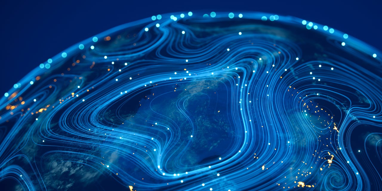 Abstract Earth with blue lines and dots showing global data flow and digital connectivity.